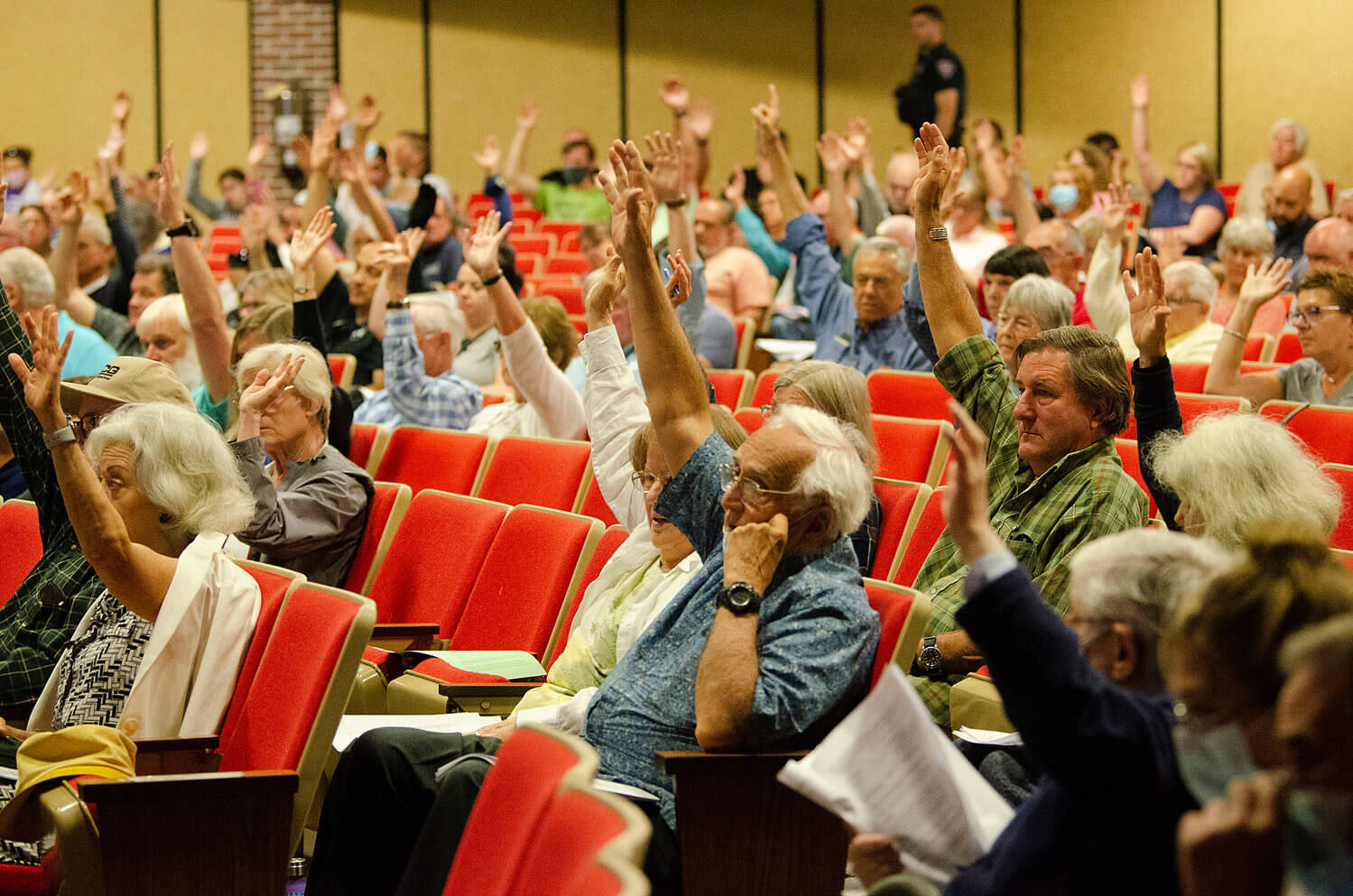 new england town meeting voting by hand