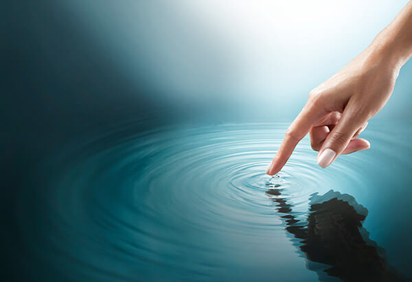 Finger Touching Water